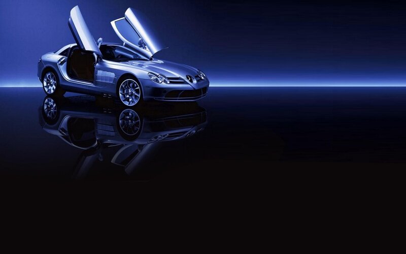 silver sports car with open doors