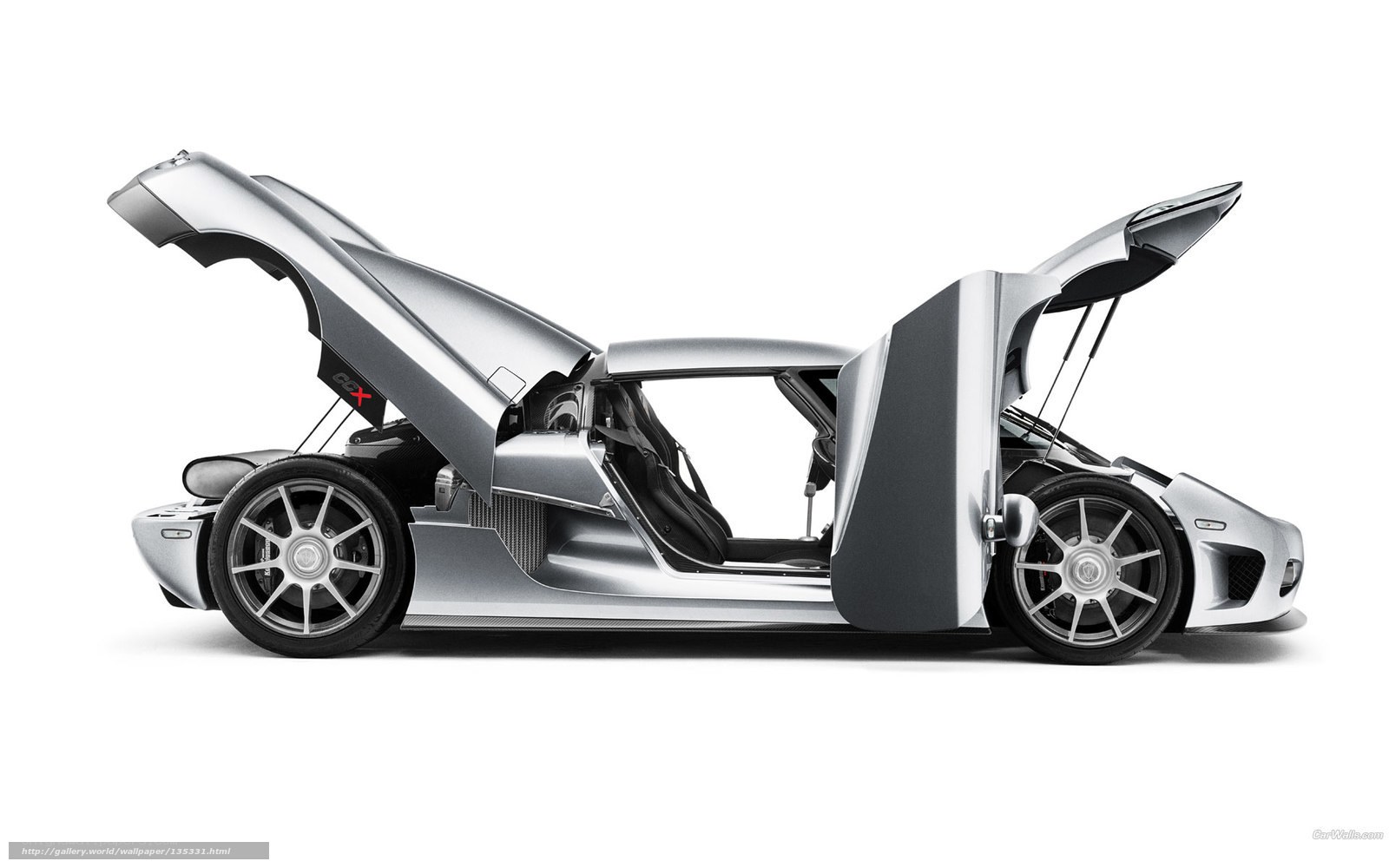 silver sports car with open doors