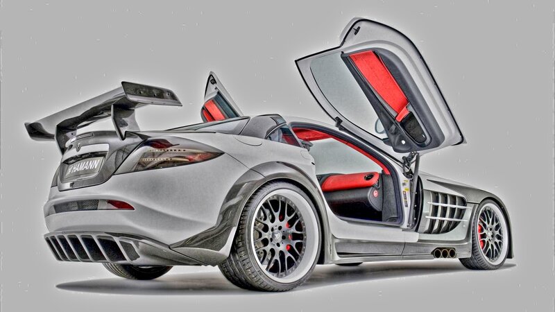 silver sports car with open doors