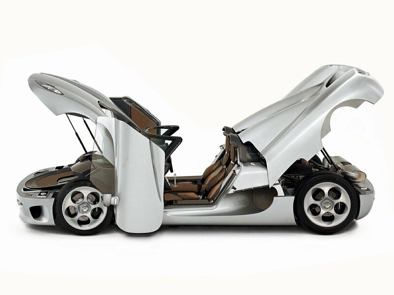 silver sports car with open doors