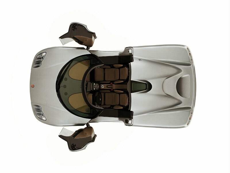 silver sports car with open doors