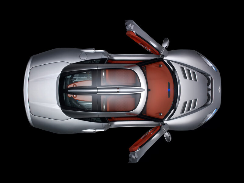 silver sports car with open doors
