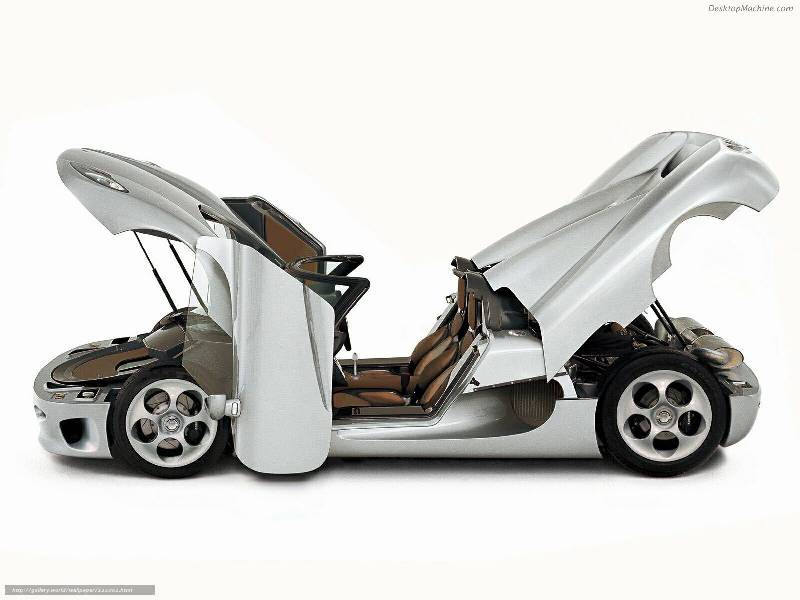 silver sports car with open doors