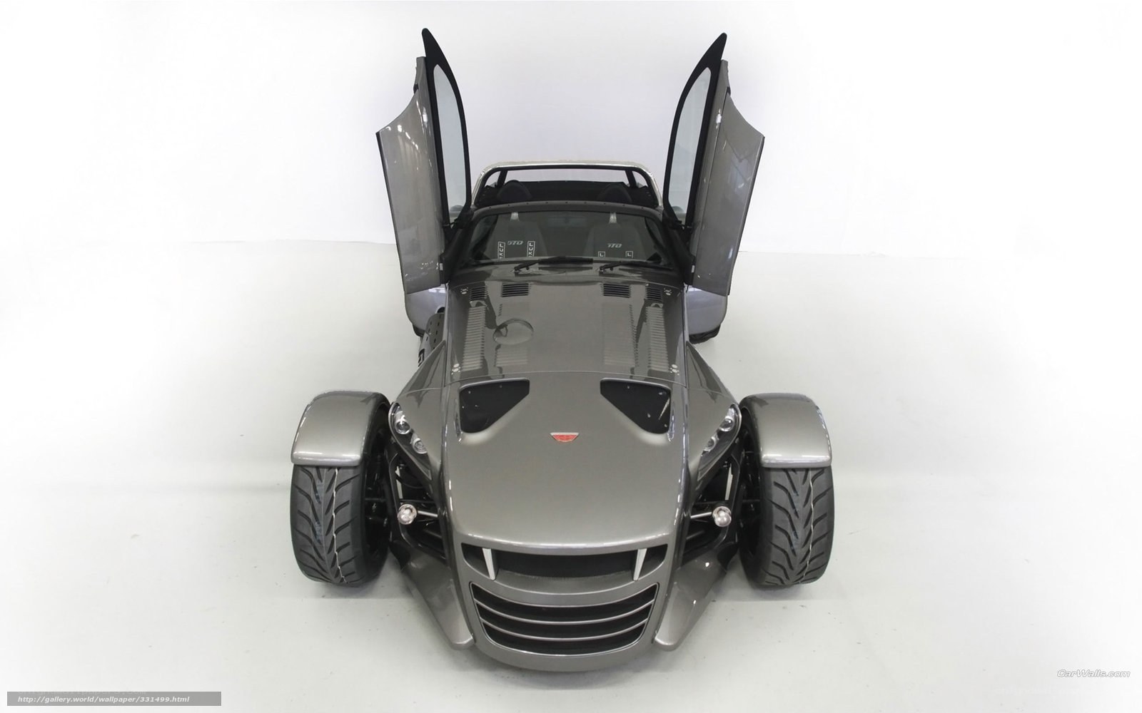 silver sports car with open doors