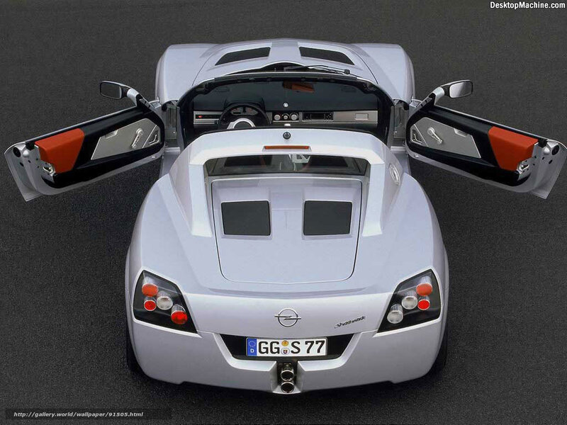 silver sports car with open doors