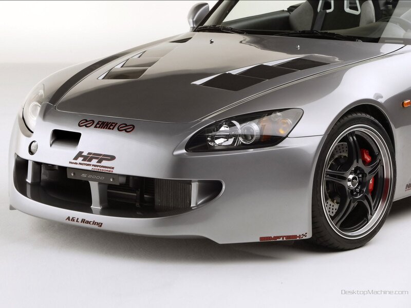 silver sports car with performance parts