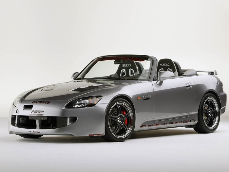 silver sports car with racing decals