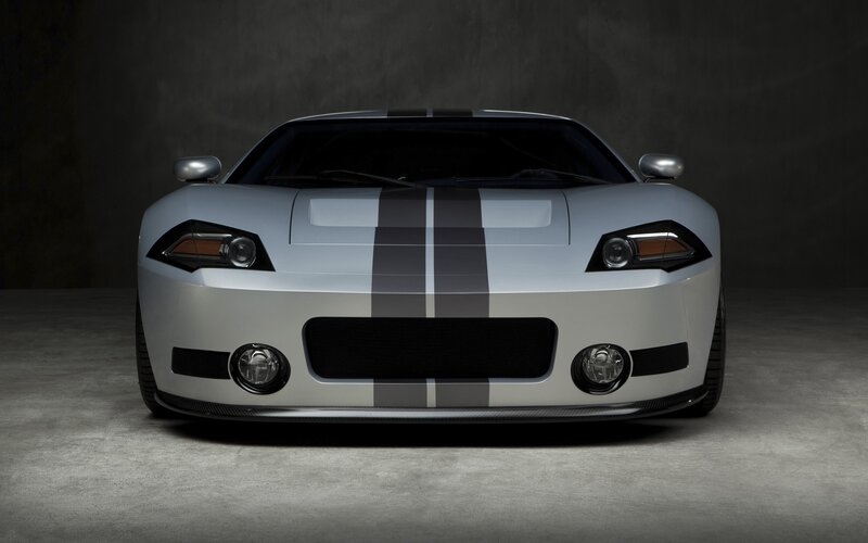 silver sports car with racing stripes