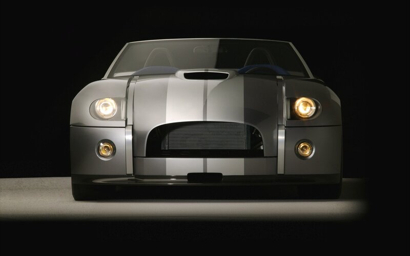 Silver sports car with racing stripes