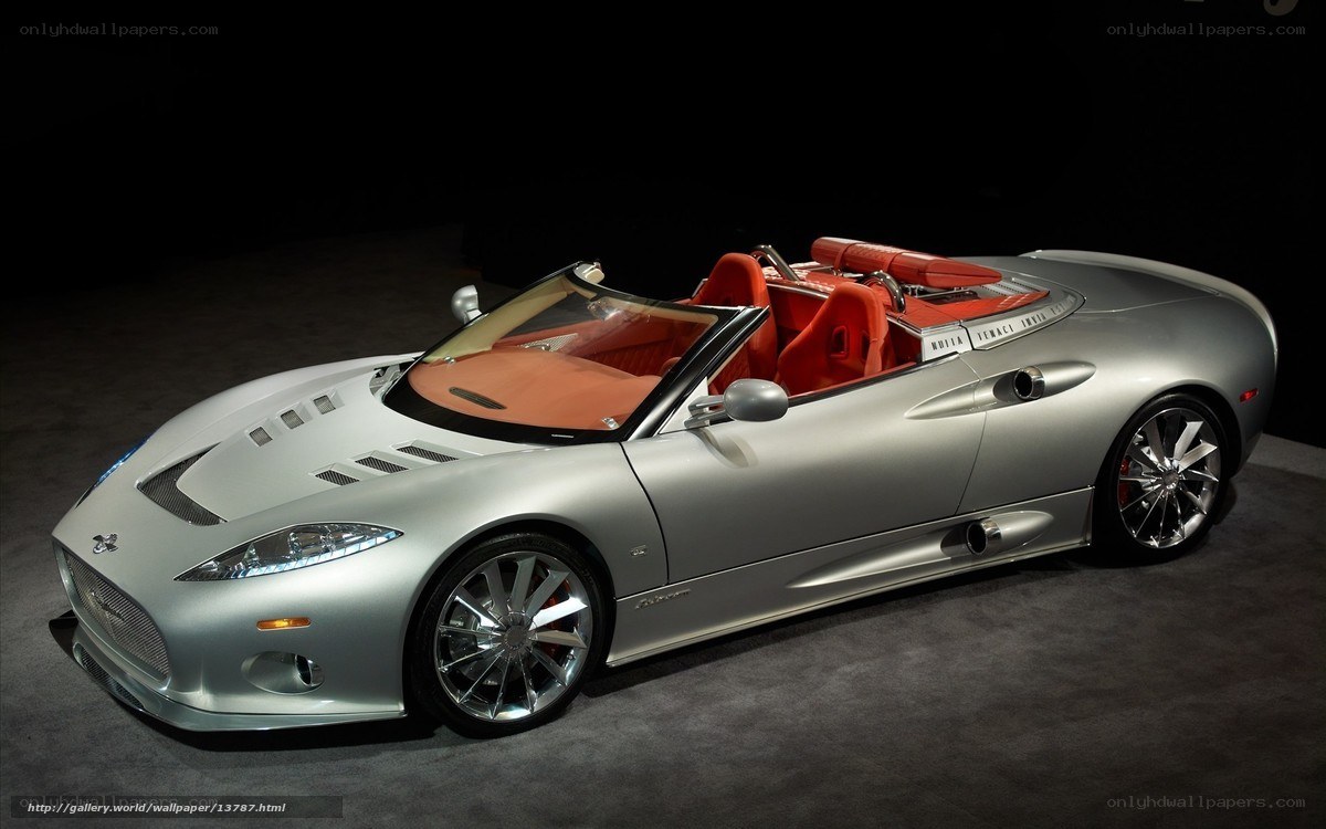 silver sports car with red interior