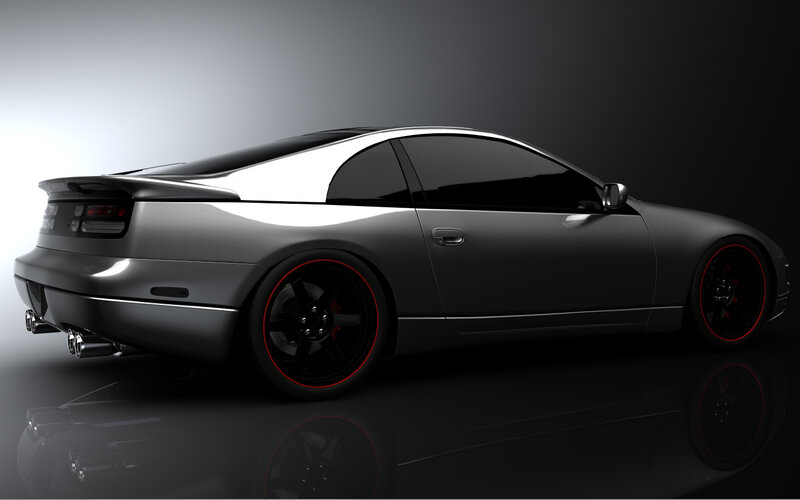 silver sports car with red rims