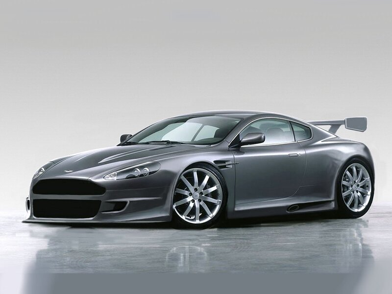 silver sports car with spoiler