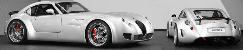 Silver sports cars on display