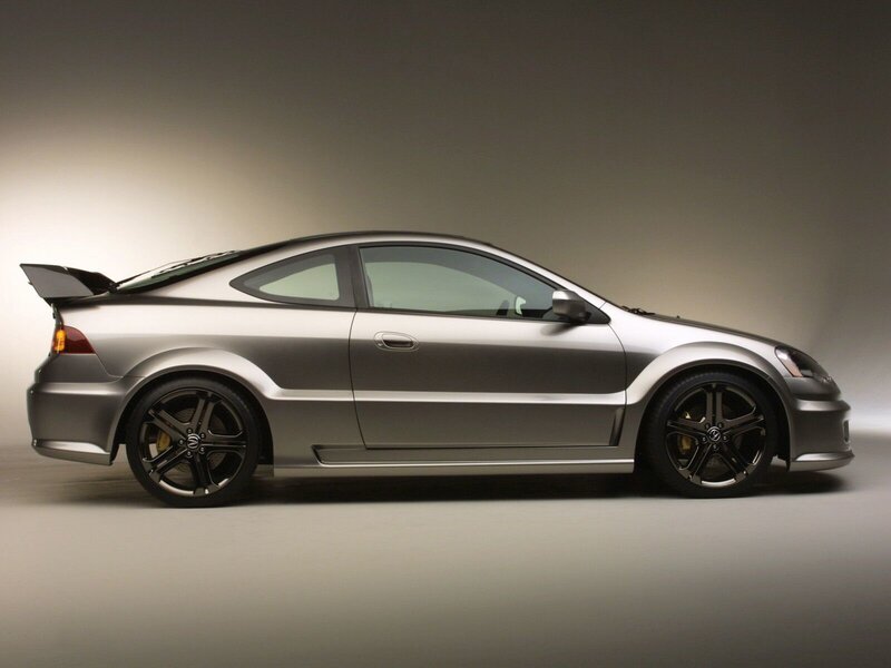 silver sports coupe with spoiler