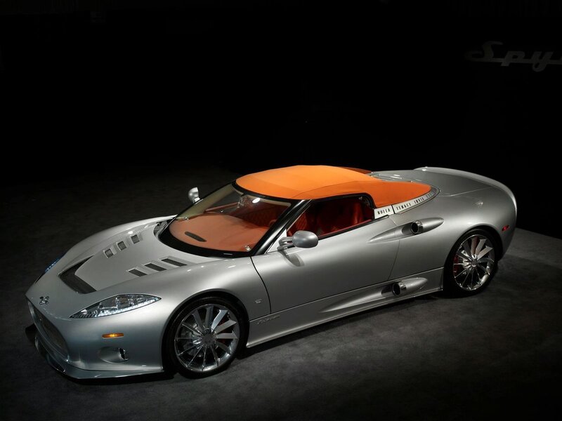 silver spyker car with orange top