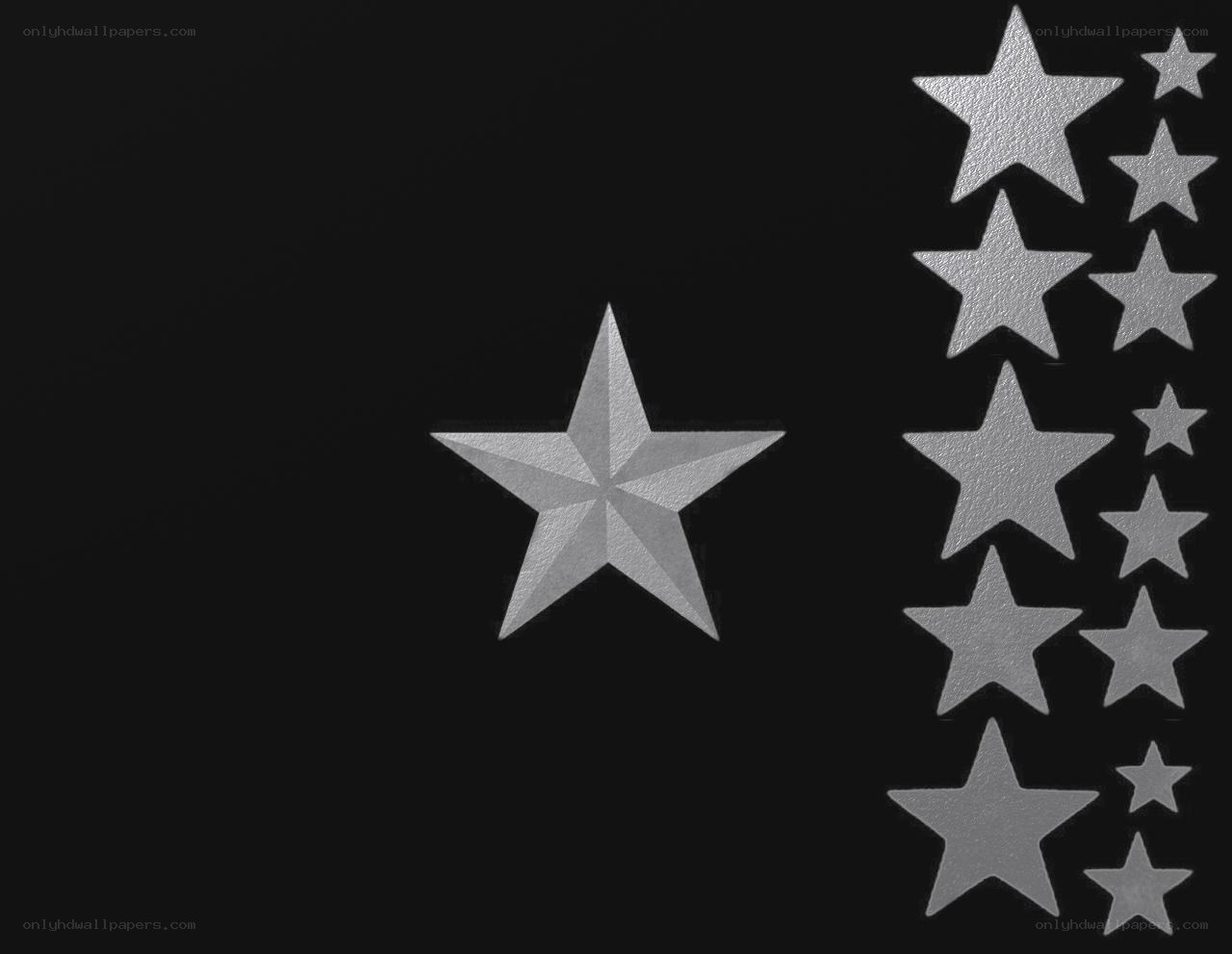 silver stars on black background