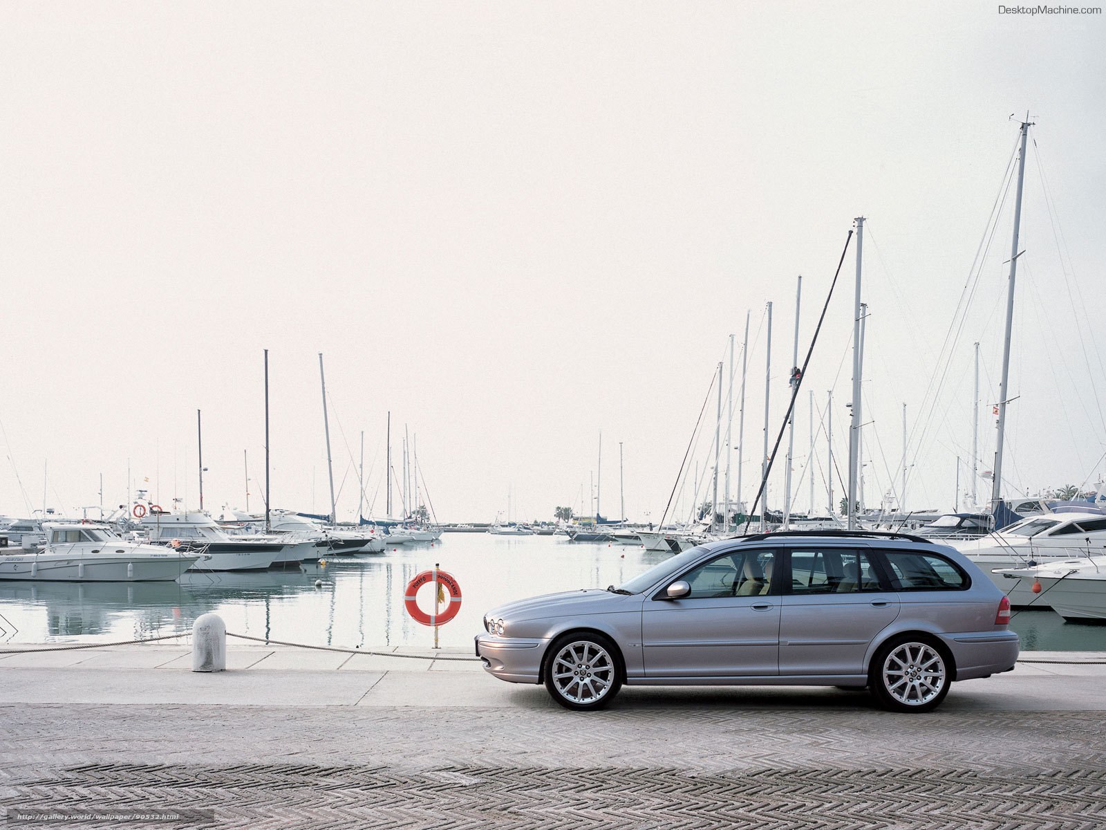 Silver station wagon at marina