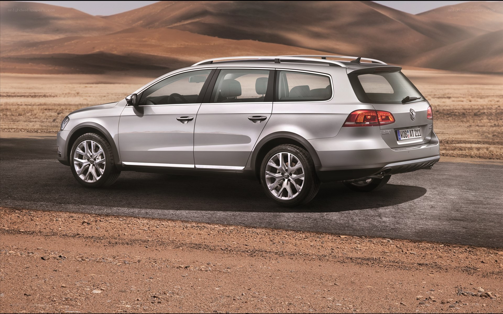 silver station wagon in desert