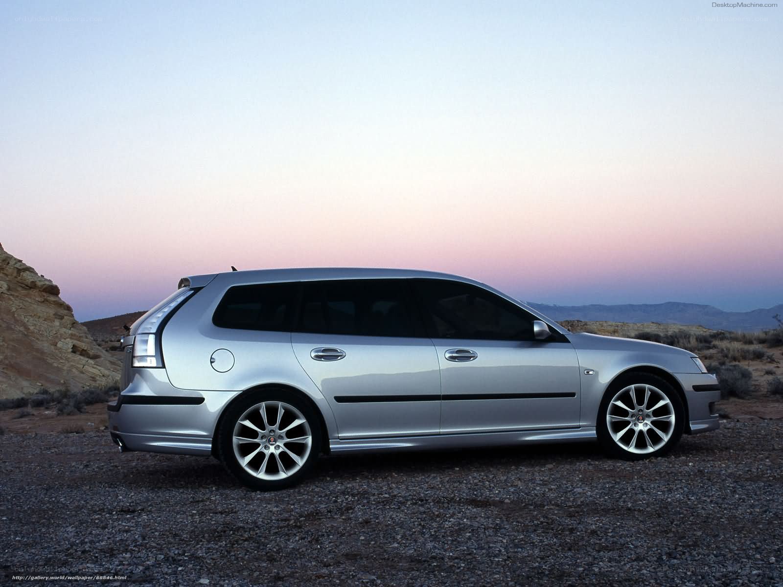 silver station wagon in desert