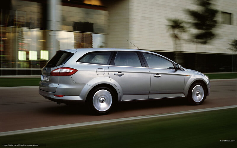 silver station wagon in motion