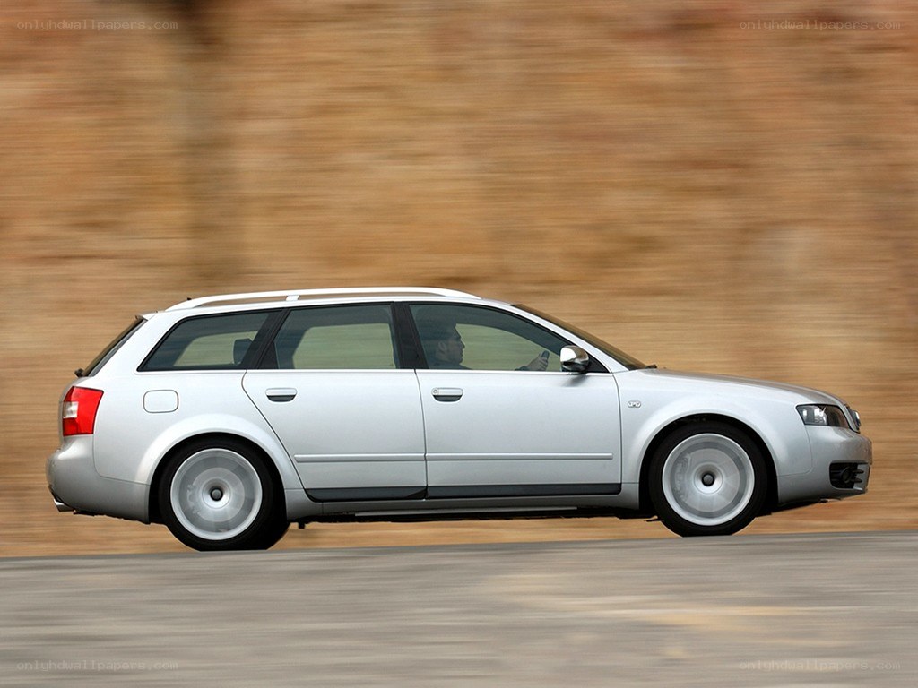 silver station wagon in motion