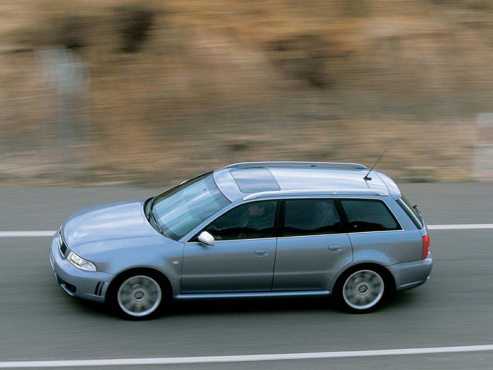 silver station wagon in motion