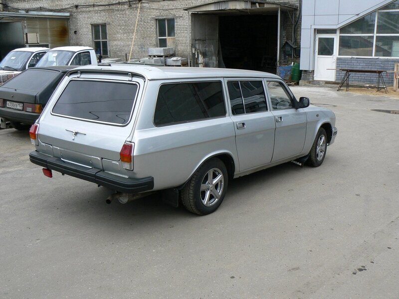 silver station wagon in parking lot