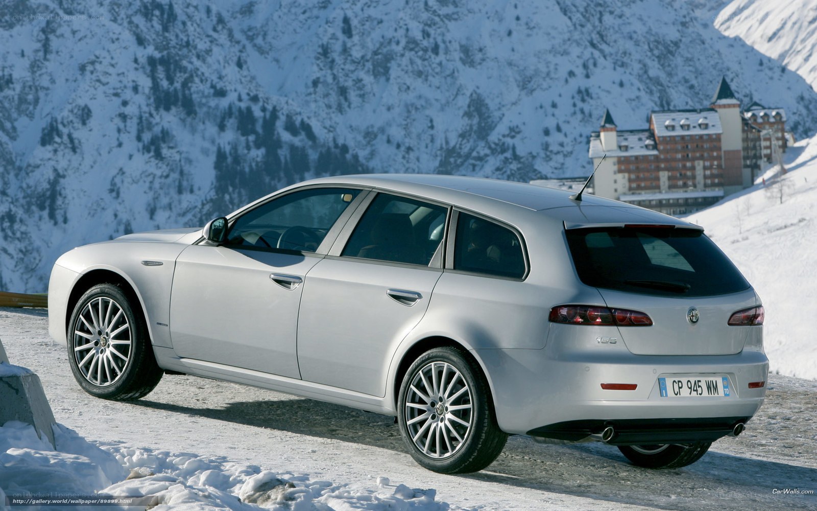 silver station wagon in snow