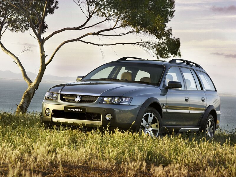 silver station wagon on a hill