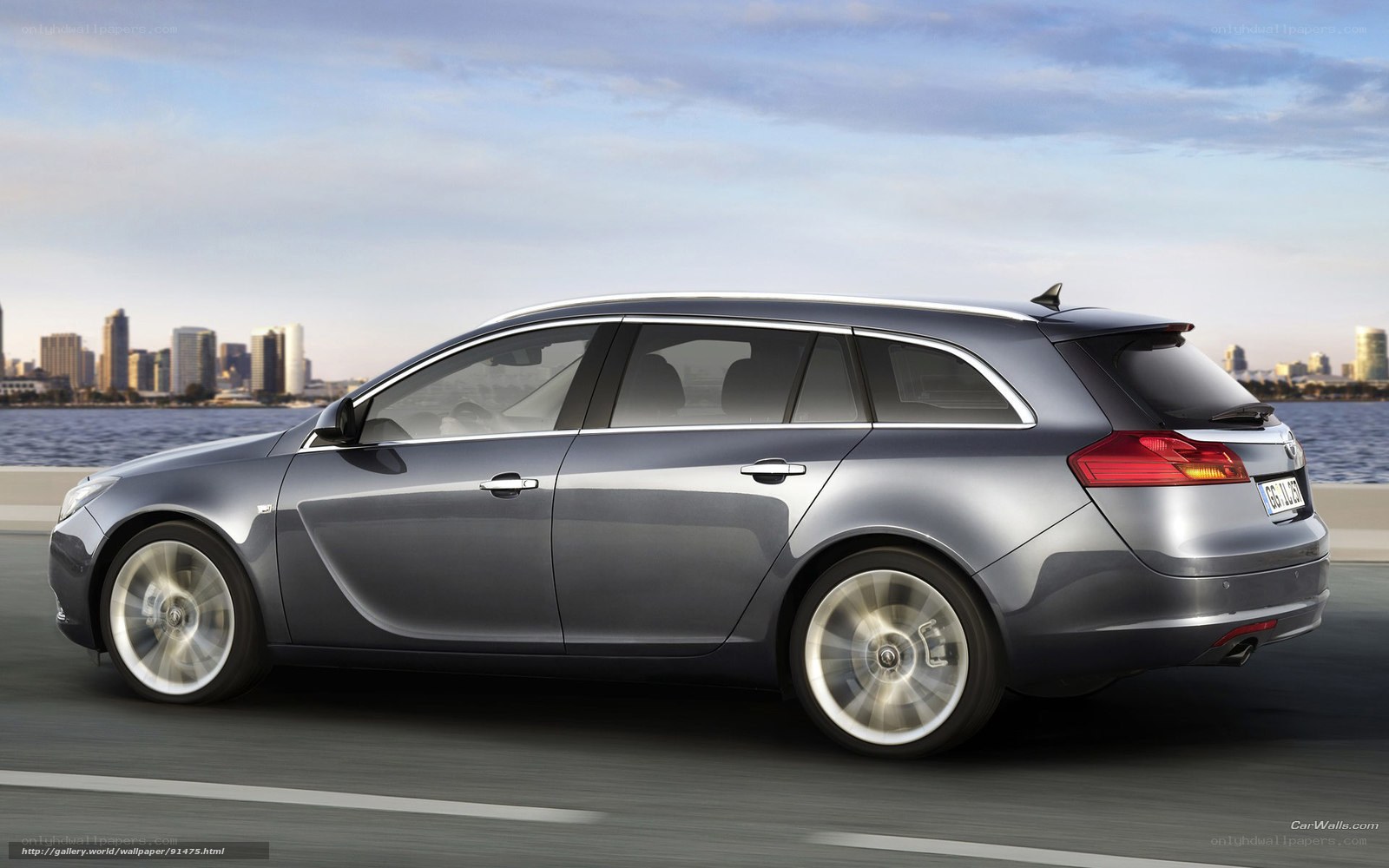 silver station wagon on road