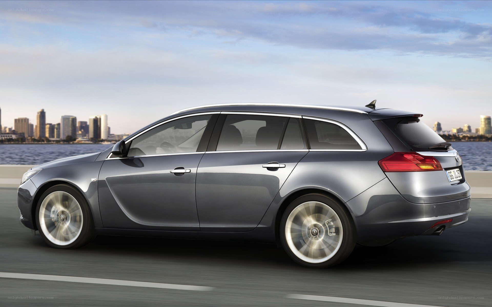 silver station wagon on road