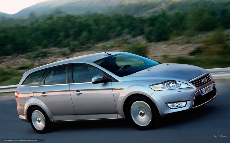 silver station wagon on road