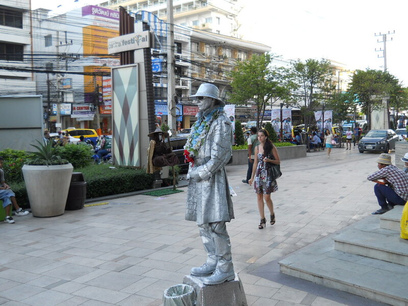 Silver Statue of Man — Gray