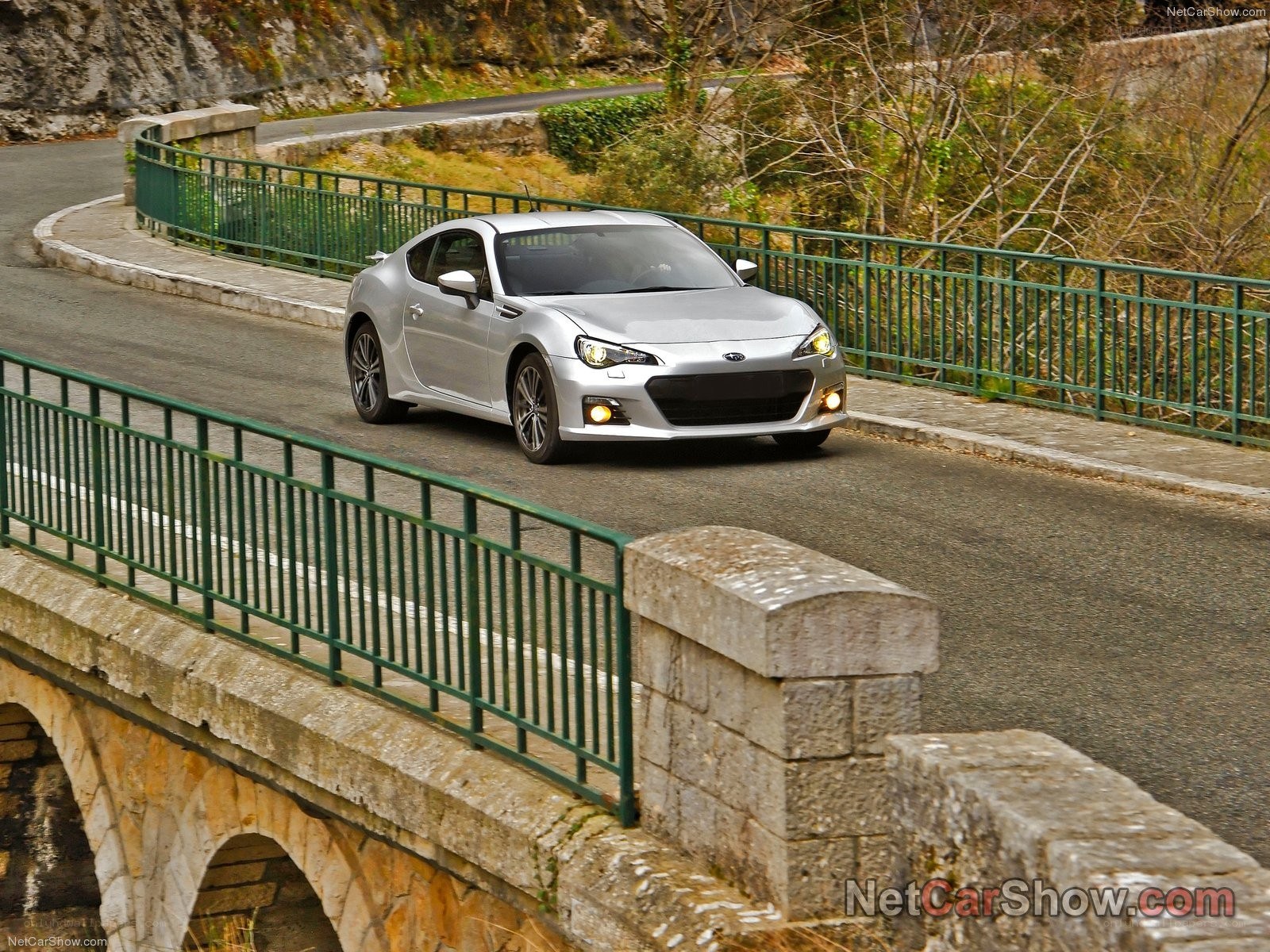 silver subaru brz on a bridge