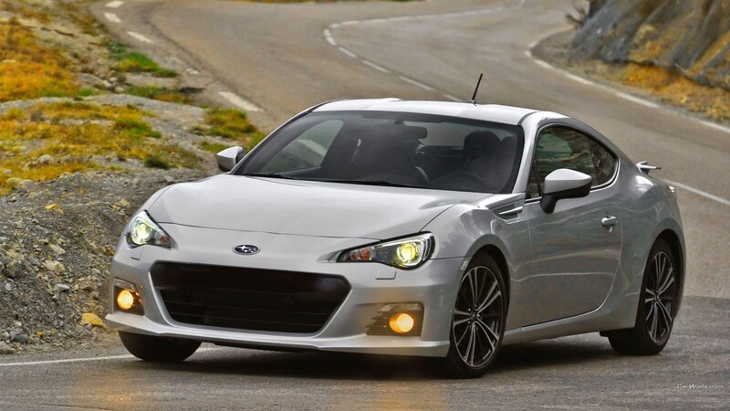 silver subaru brz on winding road