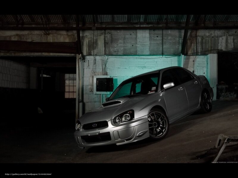 silver subaru in garage