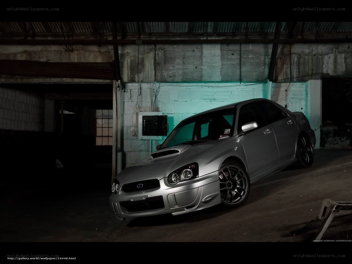 silver subaru in garage