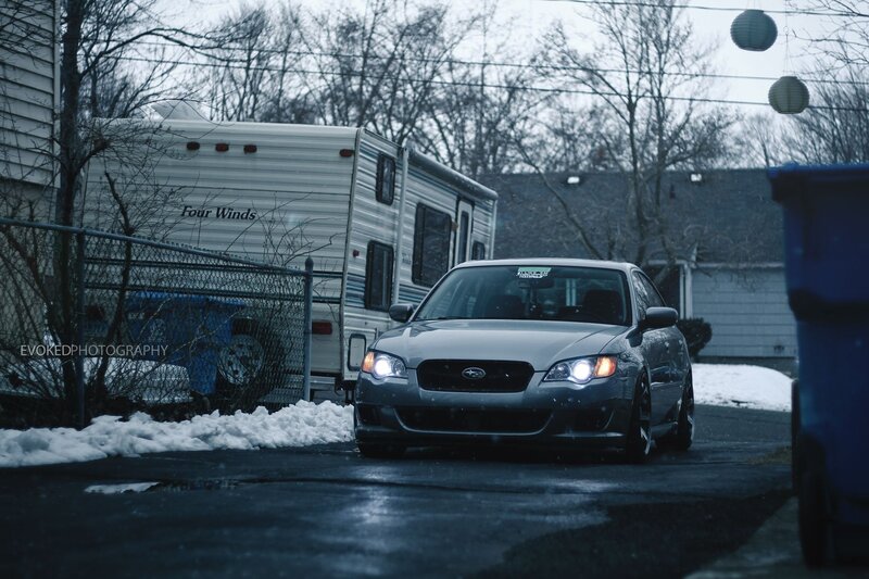 silver subaru in snowy driveway