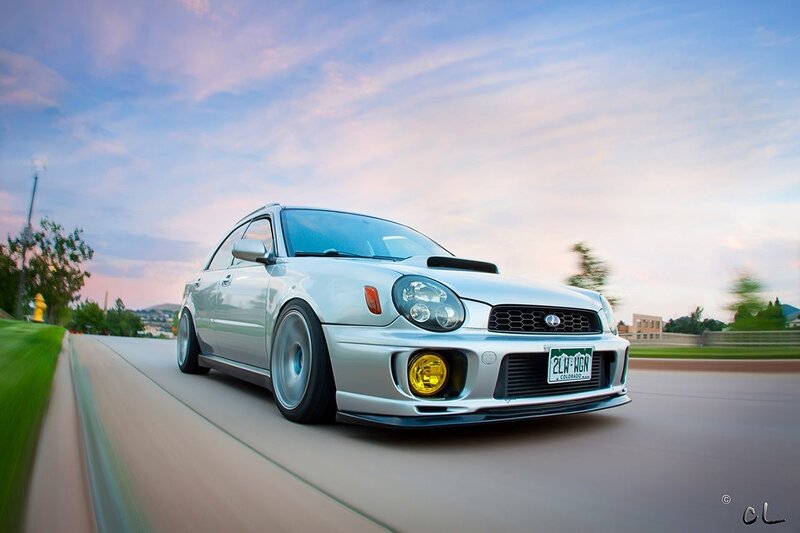 silver subaru on a road