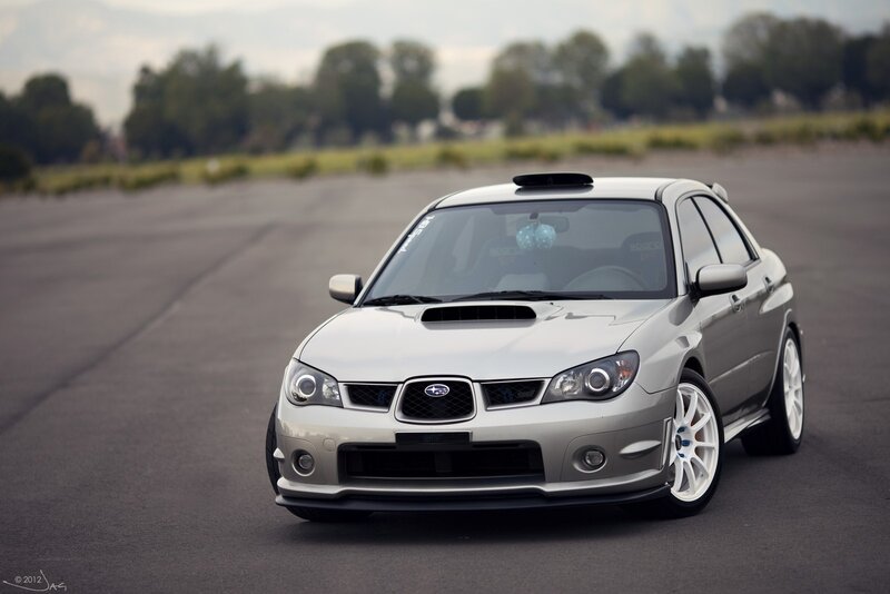silver subaru on a track