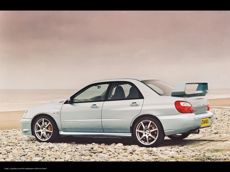 silver subaru on beach