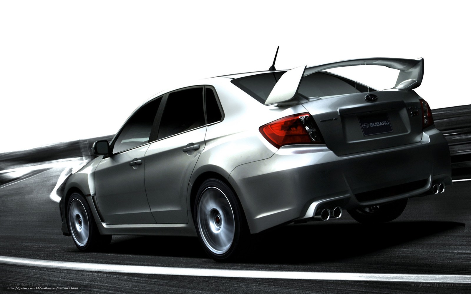 silver subaru on racetrack