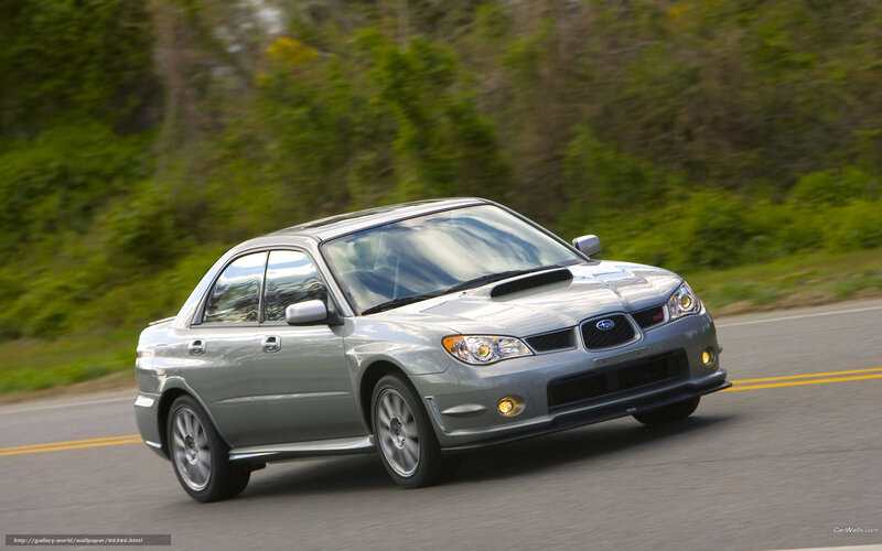 silver subaru on road
