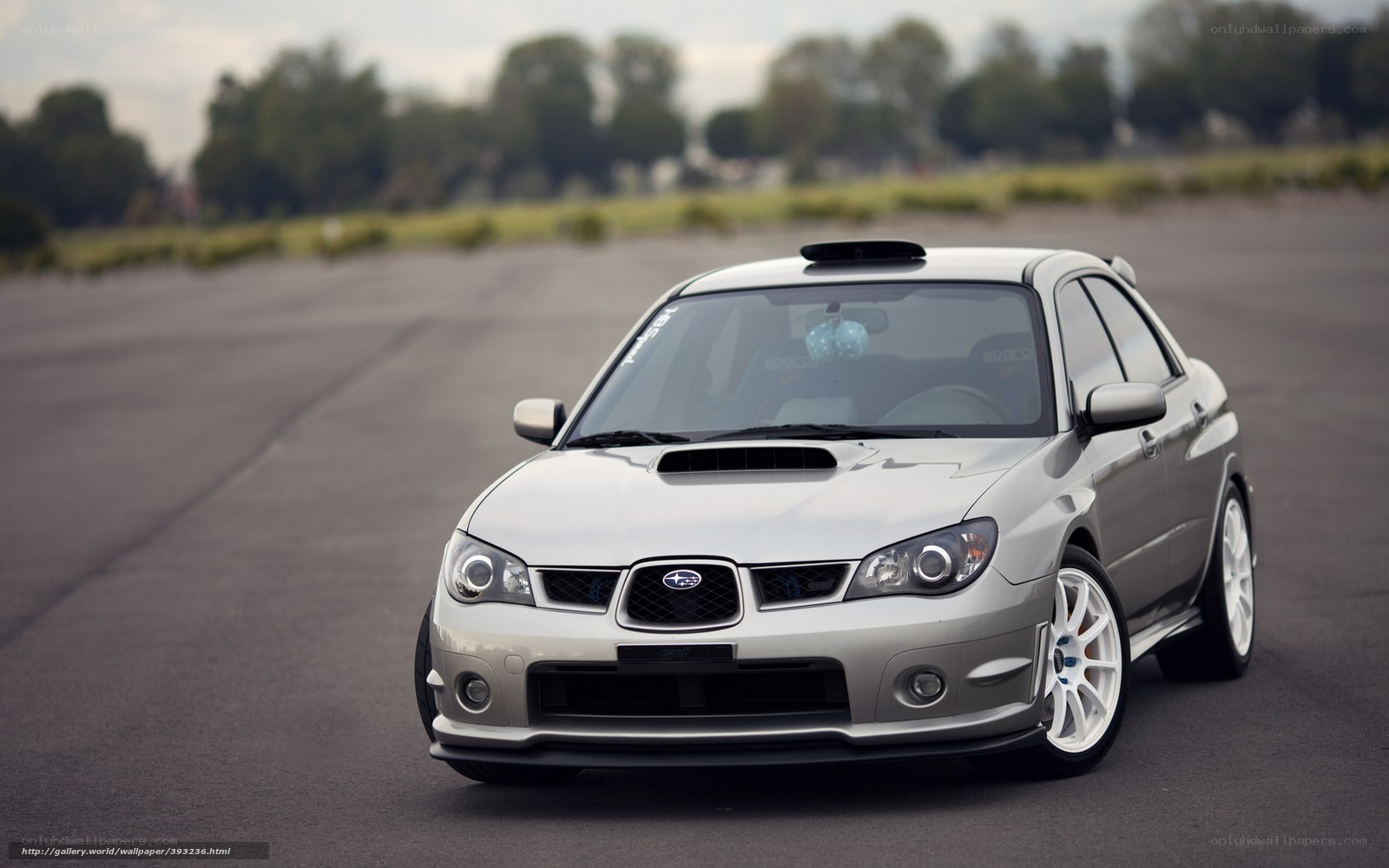 silver subaru on track