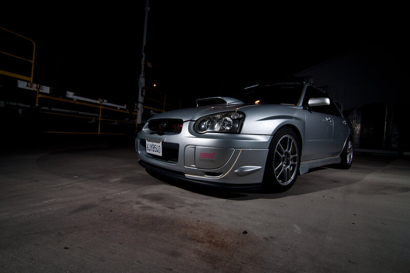 silver subaru sti at night