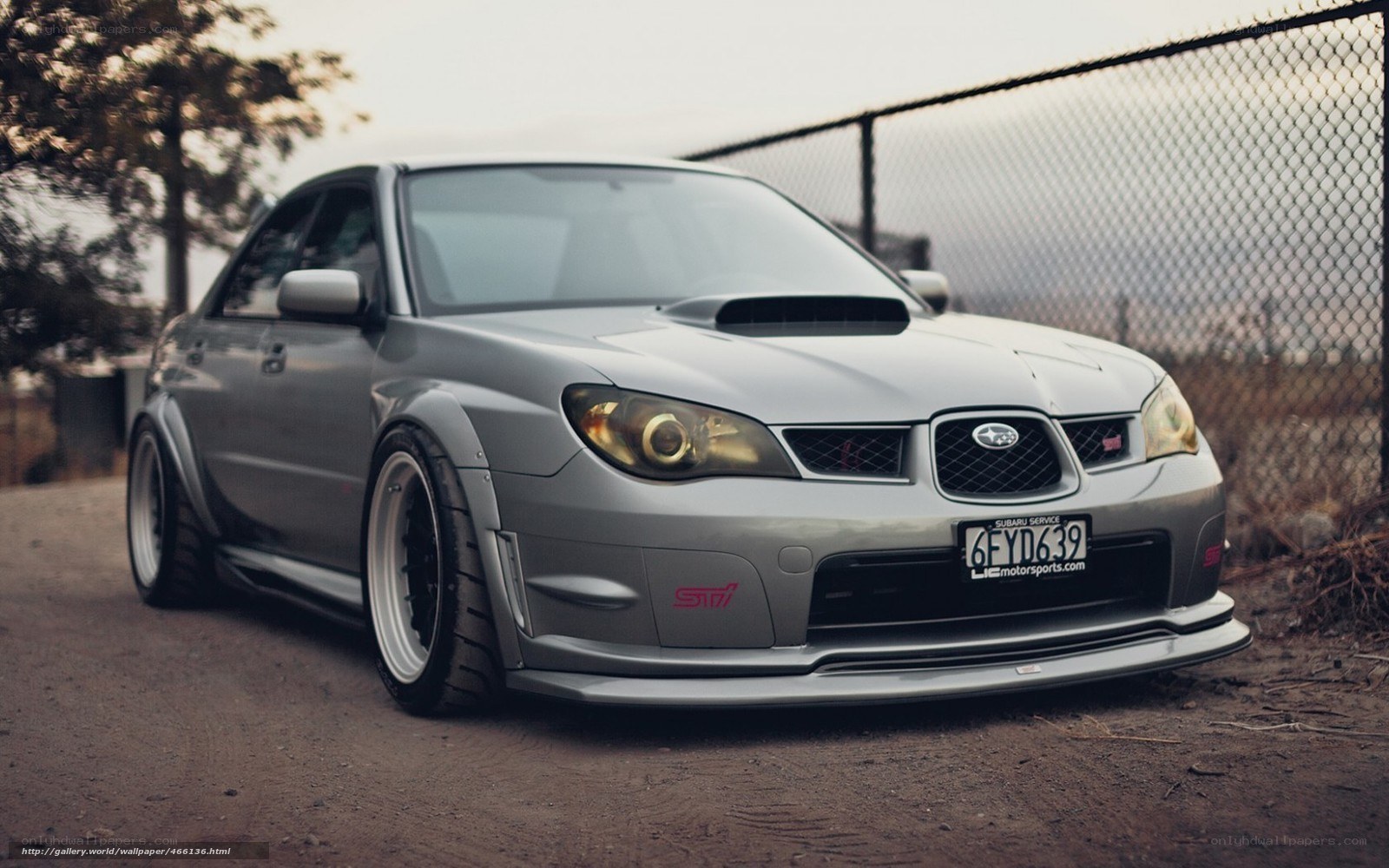 silver subaru sti car