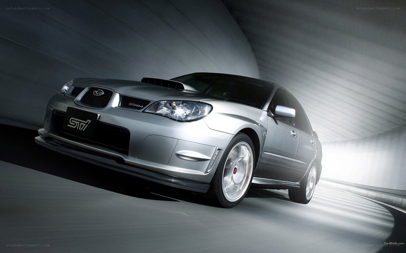 silver subaru sti in tunnel