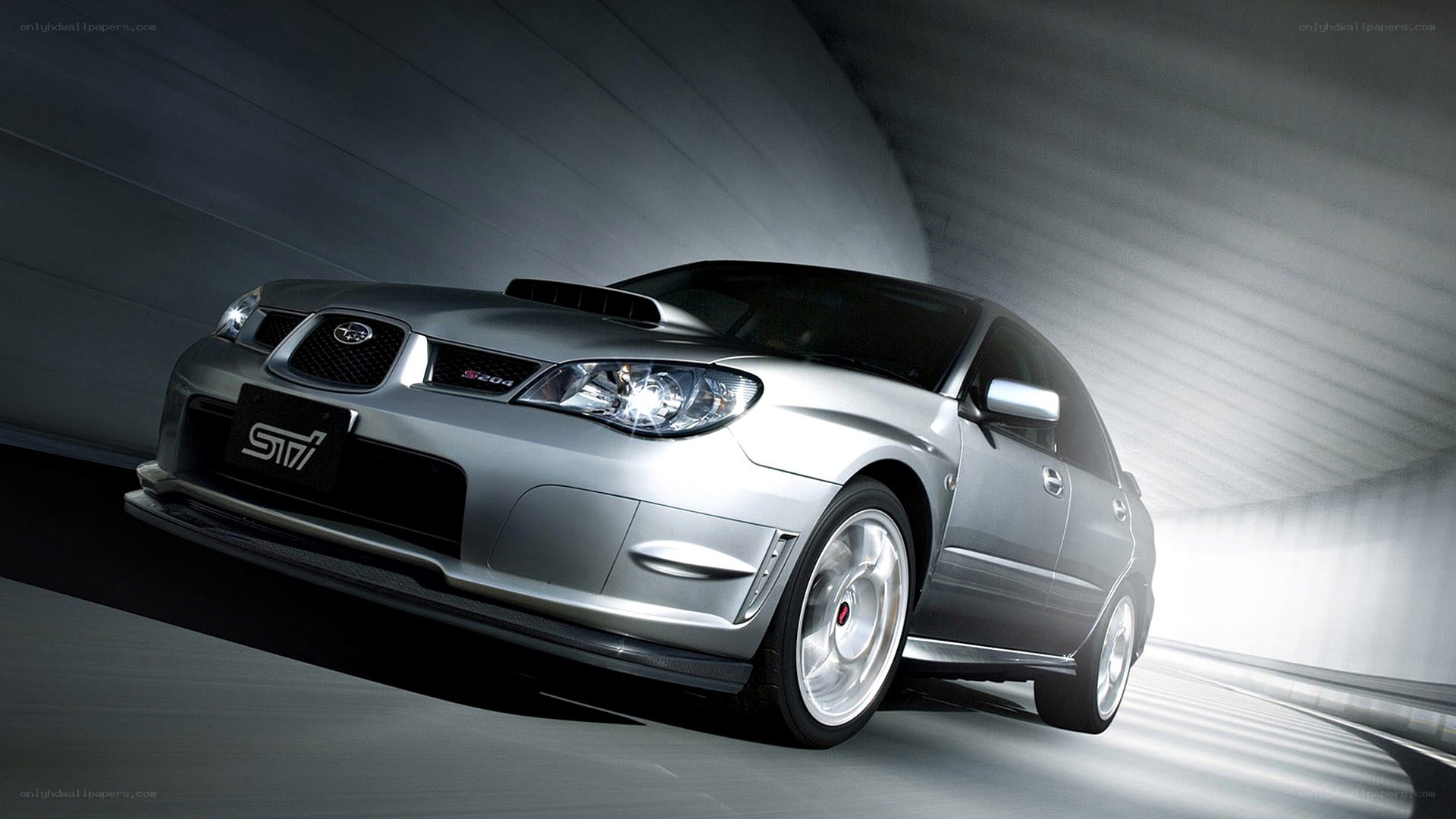 Silver Subaru STI in tunnel