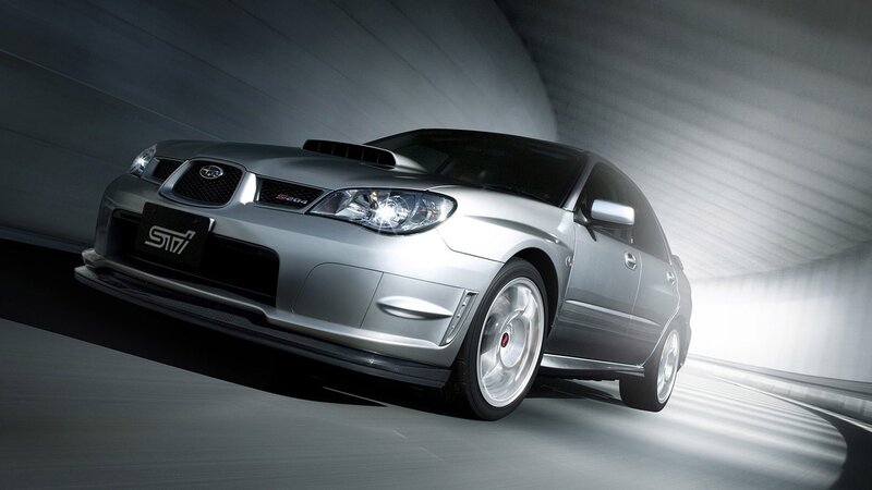 Silver Subaru STI in tunnel