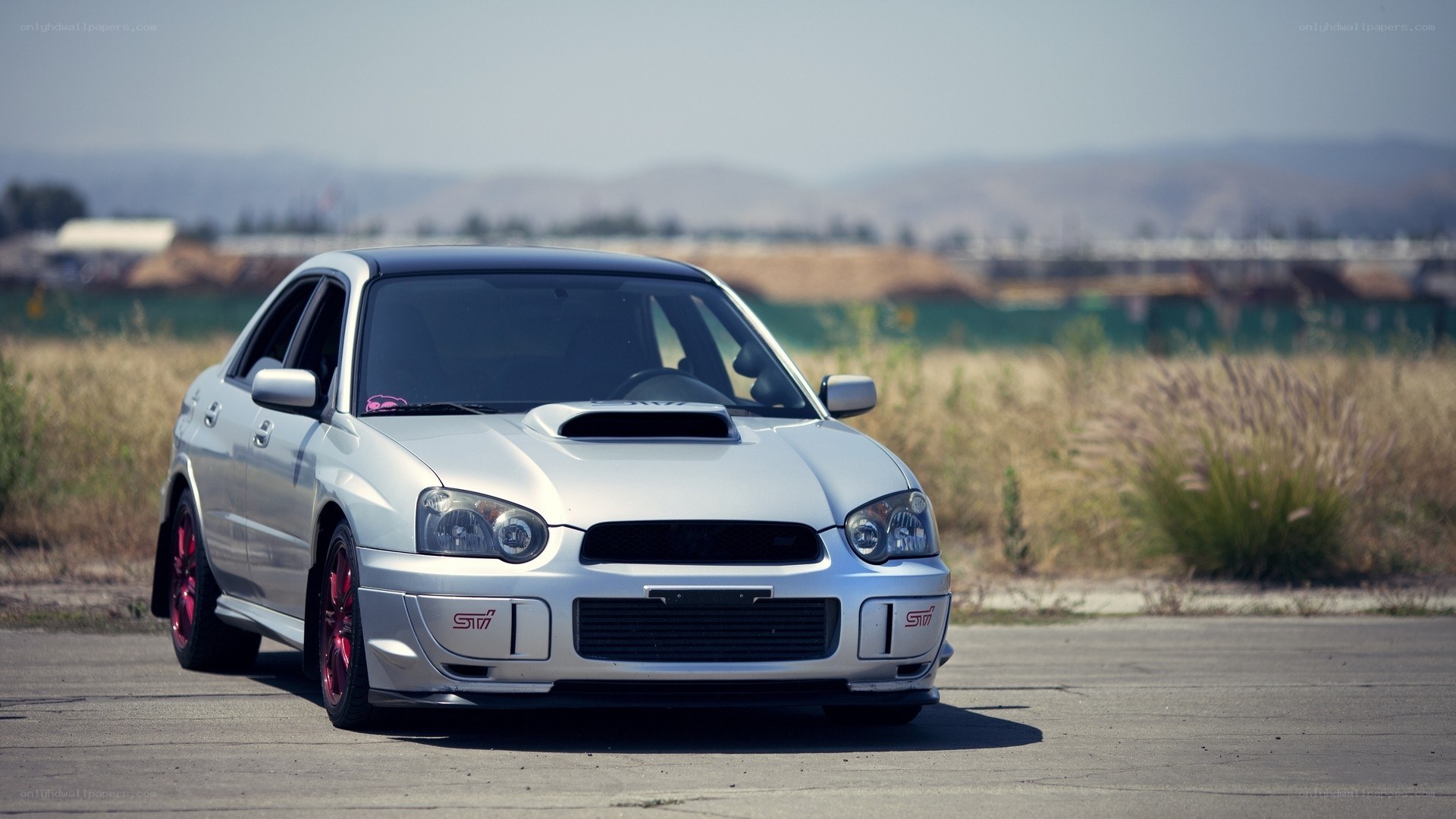 silver subaru sti on track